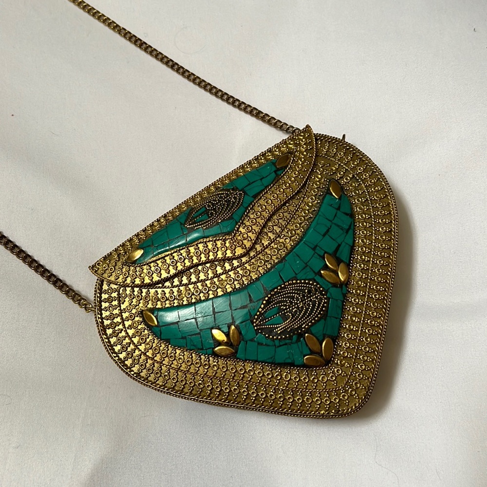Metal, gold, blue/green purse